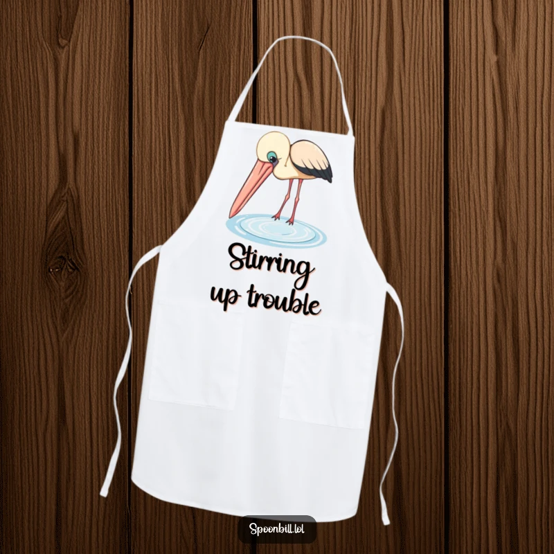 Funny Spoonbill Apron: A curious bird with a large beak peers into a small pool, adding humorous flair to kitchen activities.