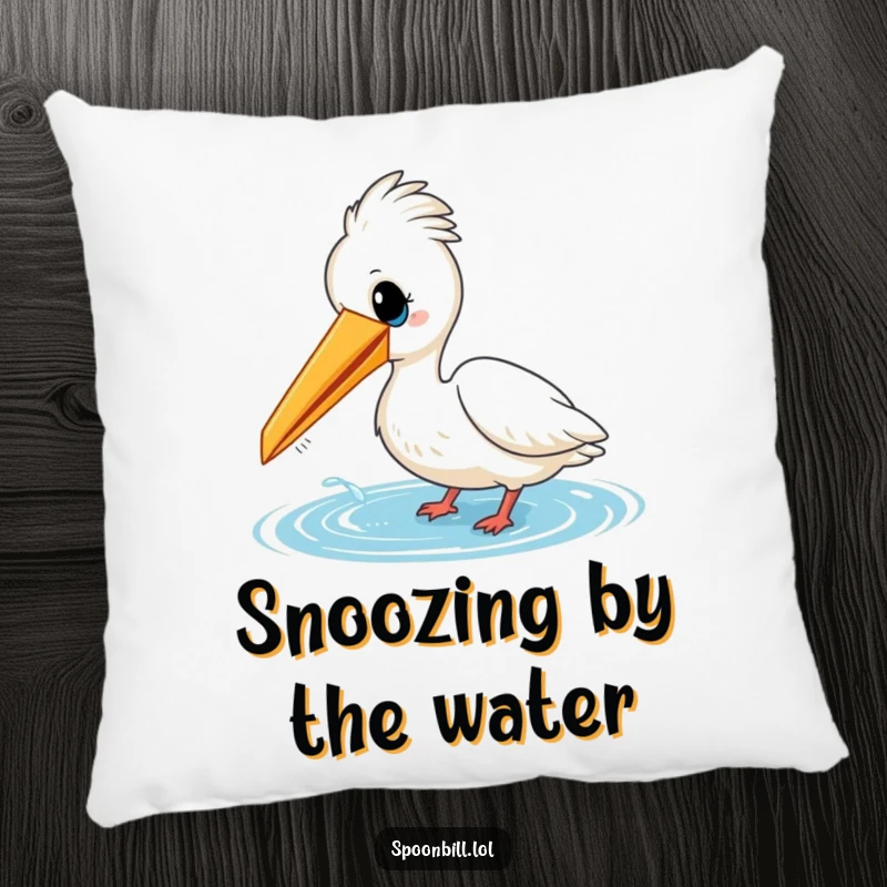 Funny pillow featuring a cheerful spoonbill bird playfully dipping its beak into water. Soft, decorative, and amusing for any couch or chair.