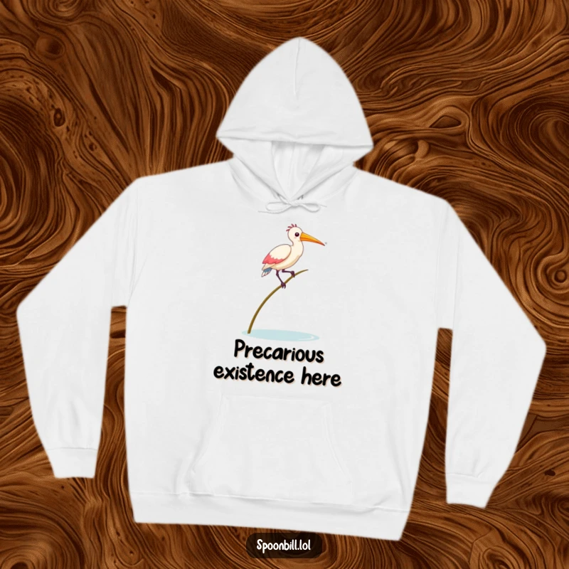 Funny Balancing Spoonbill Bird Hoodie featuring a spoonbill bird humorously trying to balance, offering cozy warmth and a lighthearted message.