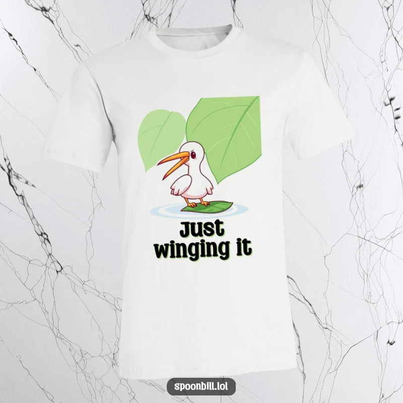 Funny Spoonbill T-Shirt: A playful spoonbill character with its long beak gently taps a floating leaf, a humorous and whimsical design.